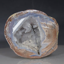 Load image into Gallery viewer, Geode with a rough, natural surface on a gray background Dugway Geode Deep Chamber