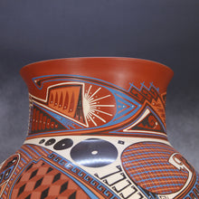 Load image into Gallery viewer, Ceramic vase with geometric patterns on a dark background
