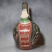Load image into Gallery viewer, Ceramic vase with geometric patterns on a gray background
