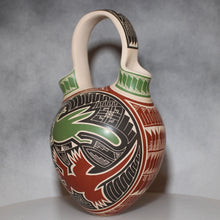 Load image into Gallery viewer, Ceramic vase with intricate designs on a gray background