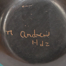 Load image into Gallery viewer, Close-up of a dark surface with a signature and initials.