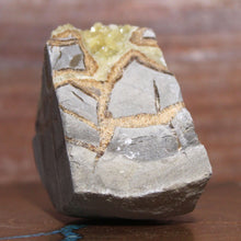Load image into Gallery viewer, Septarian Geode Section - Triangle Mass of Molten Yellow Crystals