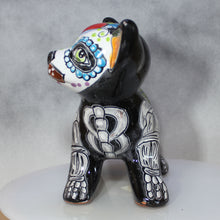 Load image into Gallery viewer, Decorative figurine of a black dog with colorful and intricate designs on a gray background
