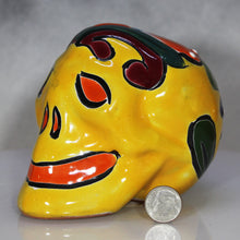 Load image into Gallery viewer, Festive Painted Day of the Dead Skull Talavera Mexican Pottery next to dime for scale