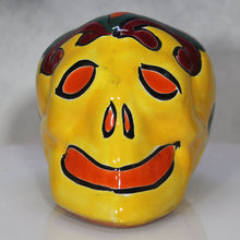 Load image into Gallery viewer, Ceramic skull with colorful face design on a white background