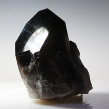 Load image into Gallery viewer, Black Smoky Quartz Large Singular Point with a central light source on a white background
