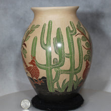Load image into Gallery viewer, Decorative vase with cactus and bird design on a cream background next to a dime for size comparison
