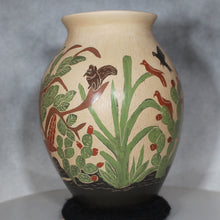 Load image into Gallery viewer, Decorative vase with artistic designs on a plain background
