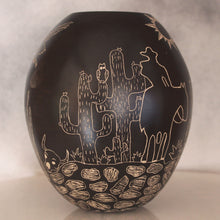 Load image into Gallery viewer, Black ceramic vase with white desert scene design on a black background
