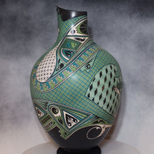 Load image into Gallery viewer, Decorative vase with geometric patterns on a gray background
