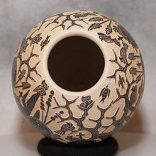 Load image into Gallery viewer, Ceramic vase with intricate hand etched skeletons on a neutral background
