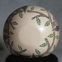 Load image into Gallery viewer, Signature of artist on mata ortiz pottery
