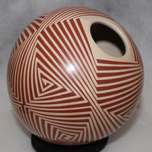 Load image into Gallery viewer, Ceramic vase with red and white geometric pattern on a gray background
