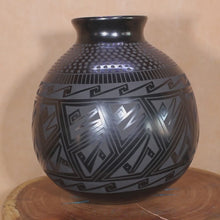 Load and play video in Gallery viewer, Ms. Tomasa Mora - Textured Black Pottery - Mata Ortiz Tradition
