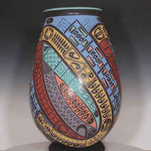 Load and play video in Gallery viewer, Video of Oscar Quezada masterpiece pottery with bright bold colors
