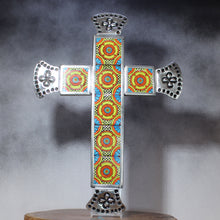 Load image into Gallery viewer, Decorative cross with colorful patterns on a dark background
