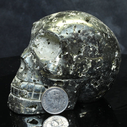 skull carving of pyrite crystal